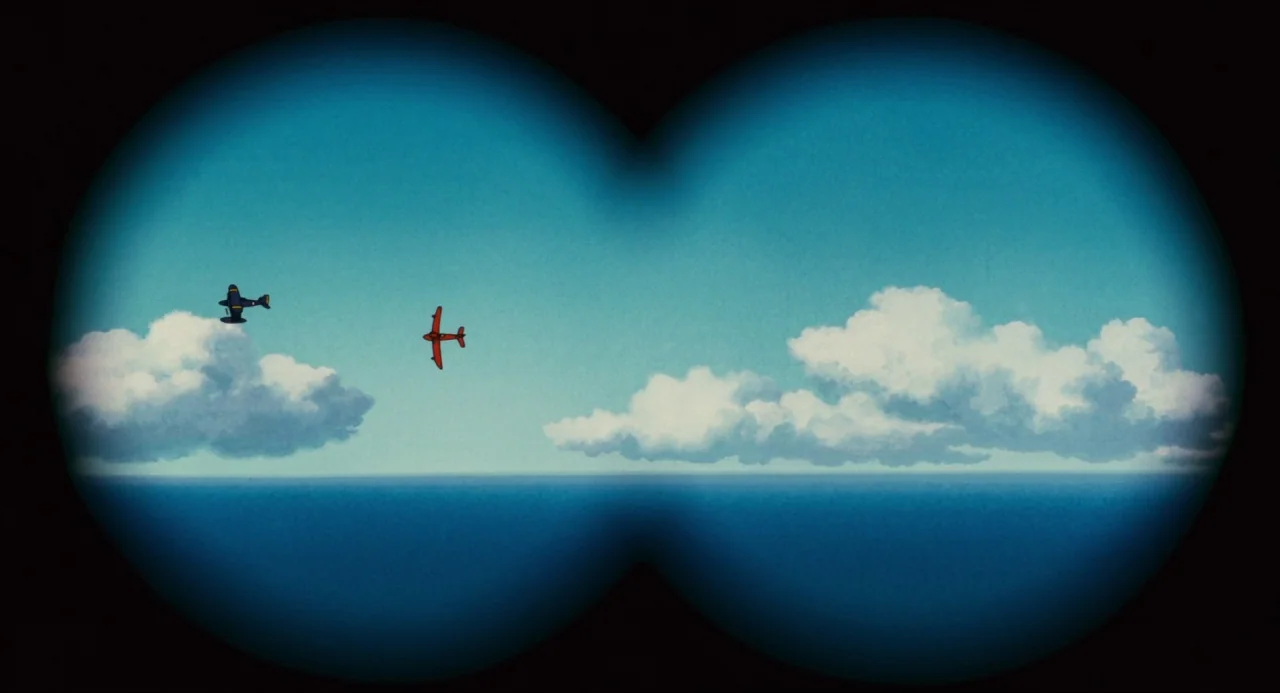 Porco Rosso (1992) movie still: wide — An expanse of blue ocean and scattered white clouds under a clear sky. Two small propeller airplanes traverse…