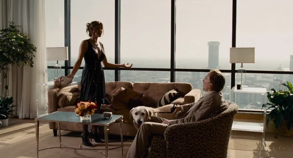 Bad Lieutenant: Port Of Call New Orleans (2009) movie still: fullbody — A luxury apartment with wall-to-ceiling windows looking out over a…