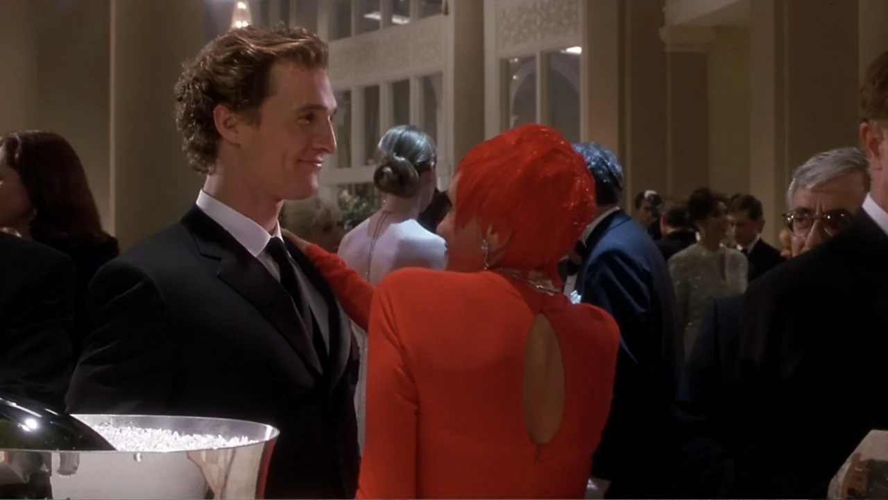 How to Lose a Guy in 10 Days (2003) movie still: medium — A crowded gala event features high ceilings and formal architectural details in the…