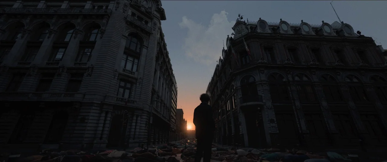 Bardo: False Chronicle of a Handful of Truths (2022) movie still: wide — An empty city street is flanked by tall, detailed historic stone buildings.…