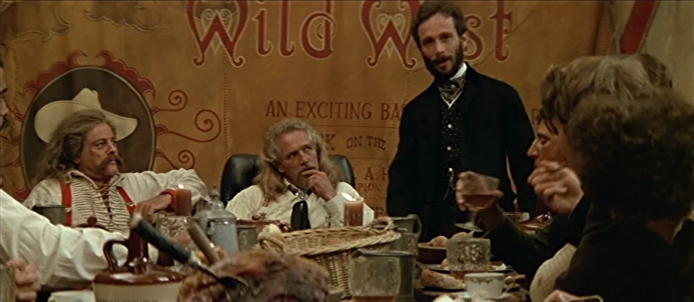 Buffalo Bill and the Indians, or Sitting Bull’s History Lesson (1976) movie still: medium — Inside a large tent with canvas walls printed with Wild…