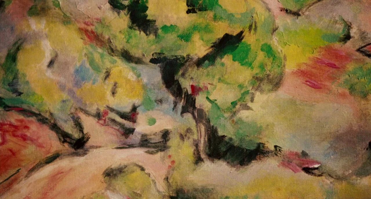 Howl (2010) movie still: closeup — A close-up view of a canvas showing dense, layered impasto oil paint application. The brushstrokes create…