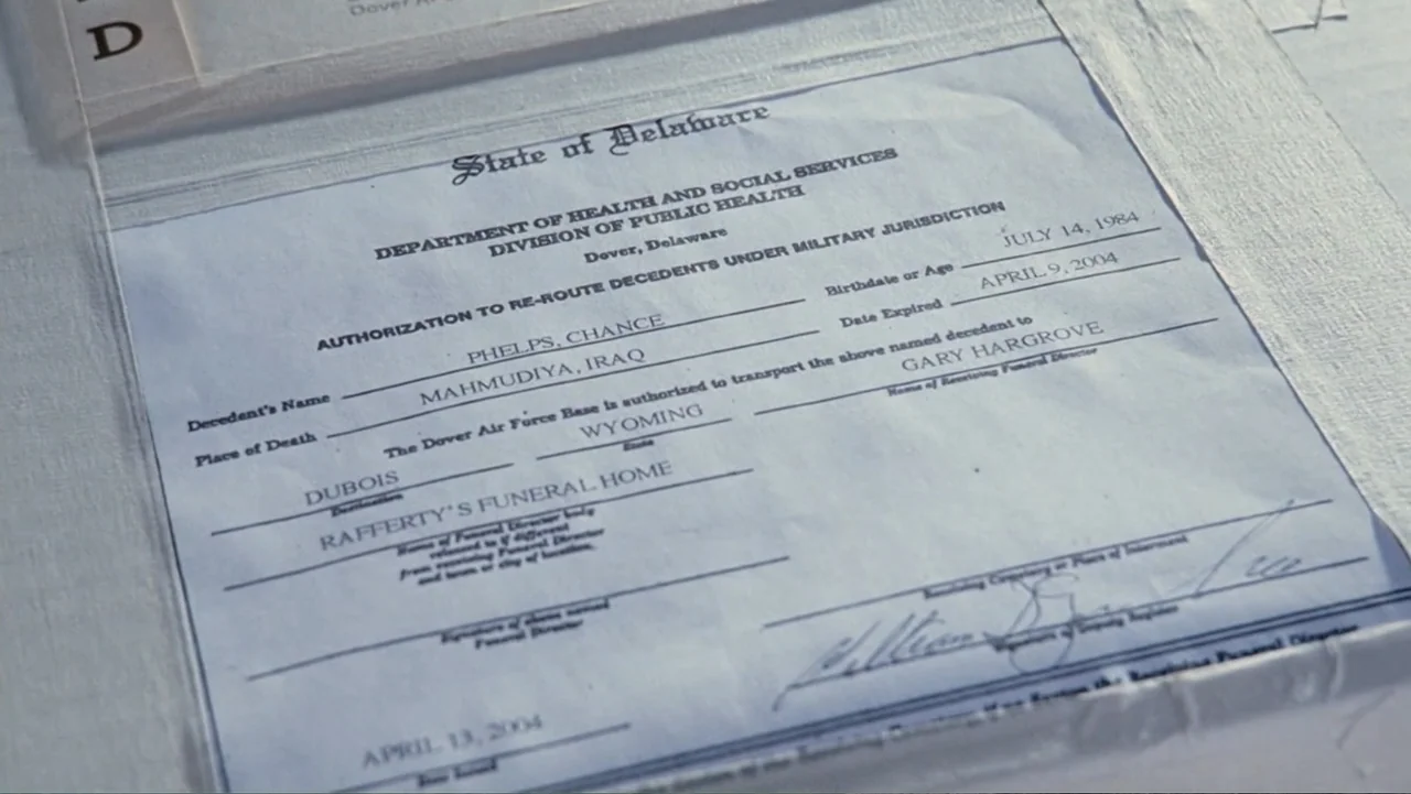 Taking Chances (2011) movie still: closeup — A close-up view shows a formal death authorization document from the State of Delaware. The text…