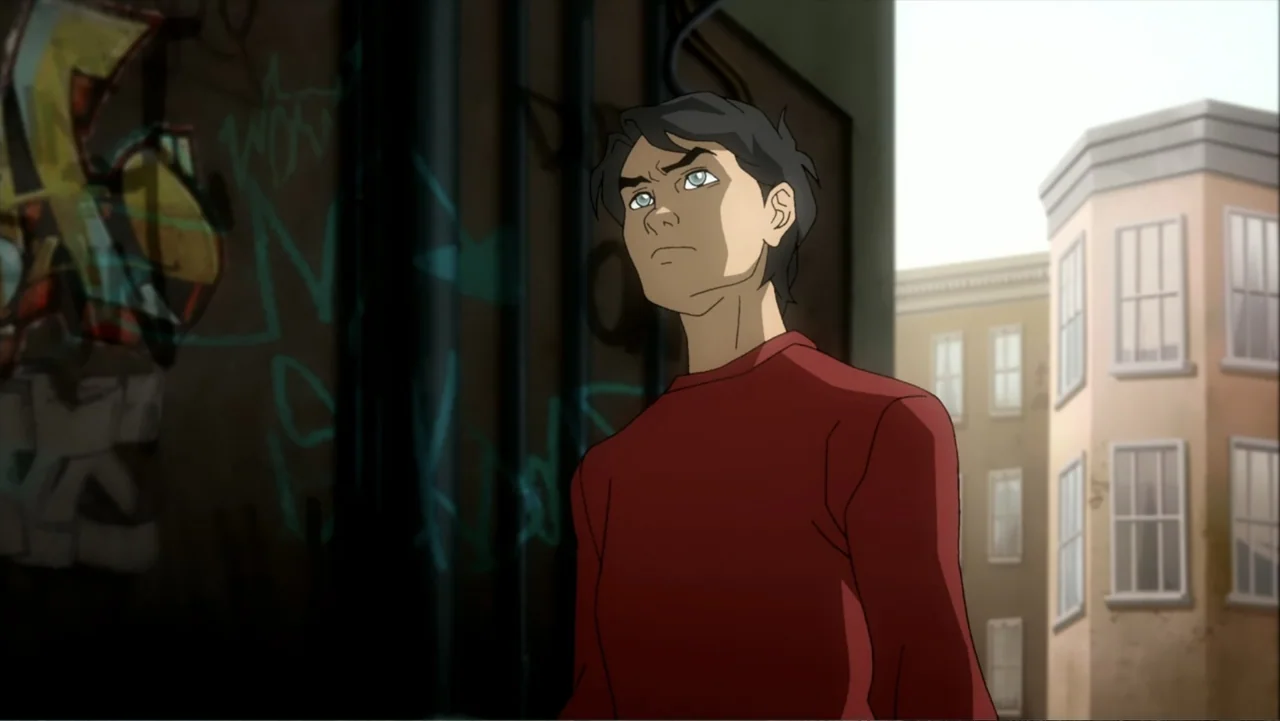 Superman/Shazam!: The Return of Black Adam (2010) movie still: medium — An urban alleyway features a dark graffiti-covered wall adjacent to a tall…
