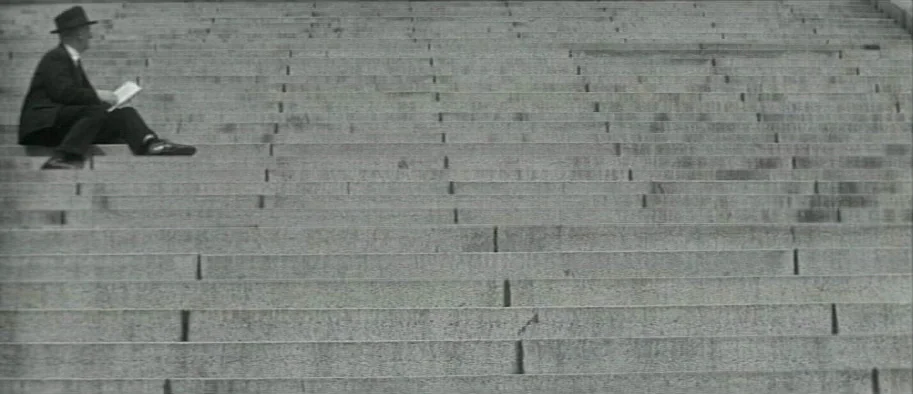 And The Fifth Horseman is Fear (1965) movie still: wide — Wide outdoor stone steps stretch across the frame, leading up to an unseen landing. A…