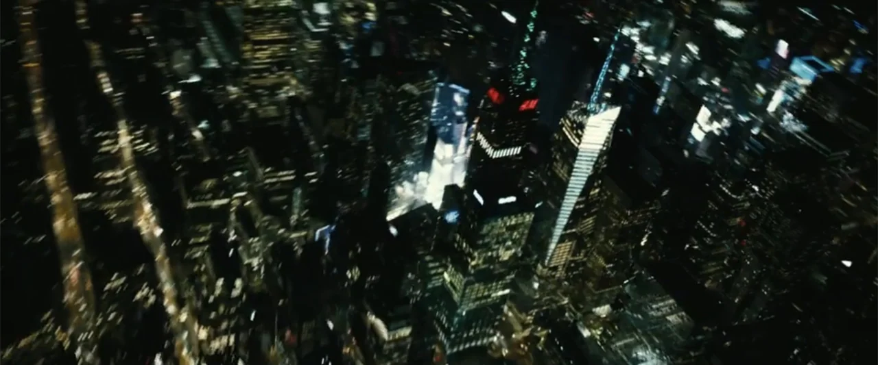 Run All Night (2015) movie still: establishing — A dense urban grid of skyscrapers is viewed from an extreme high angle. Multiple office buildings…