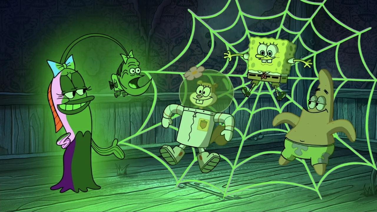 SpongeBob Squarepants: Kreepaway Kamp (2024) movie still: medium — A dimly lit room with wood-paneled walls holds a large, glowing green spider web.…