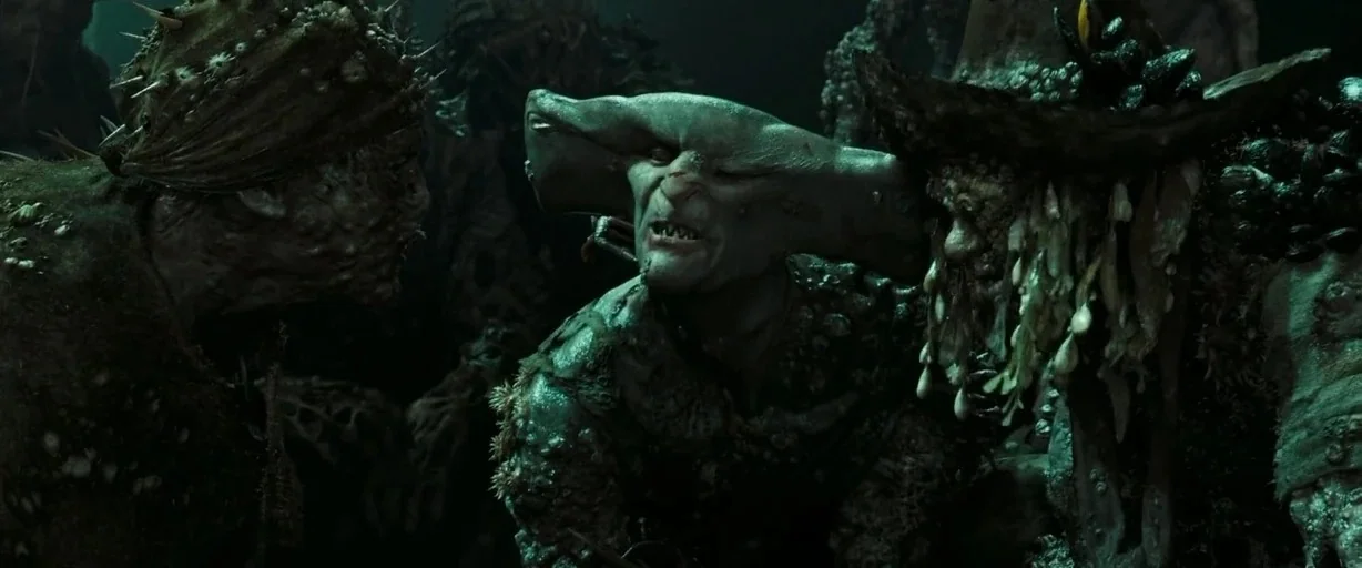 Pirates of the Caribbean: Dead Man’s Chest movie still: medium — The interior of a ship deck features several creatures covered in barnacles and sea…