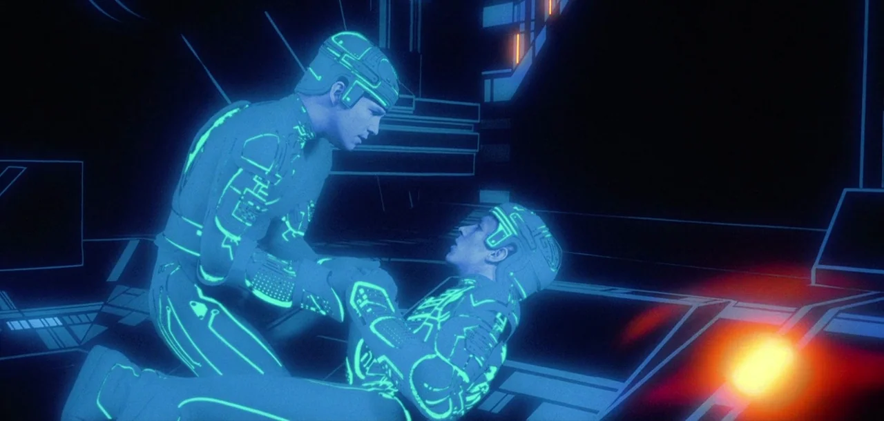 Tron (1982) movie still: medium — A dark, abstract digital landscape consists of infinite black space with geometric floor lines. Two figures…