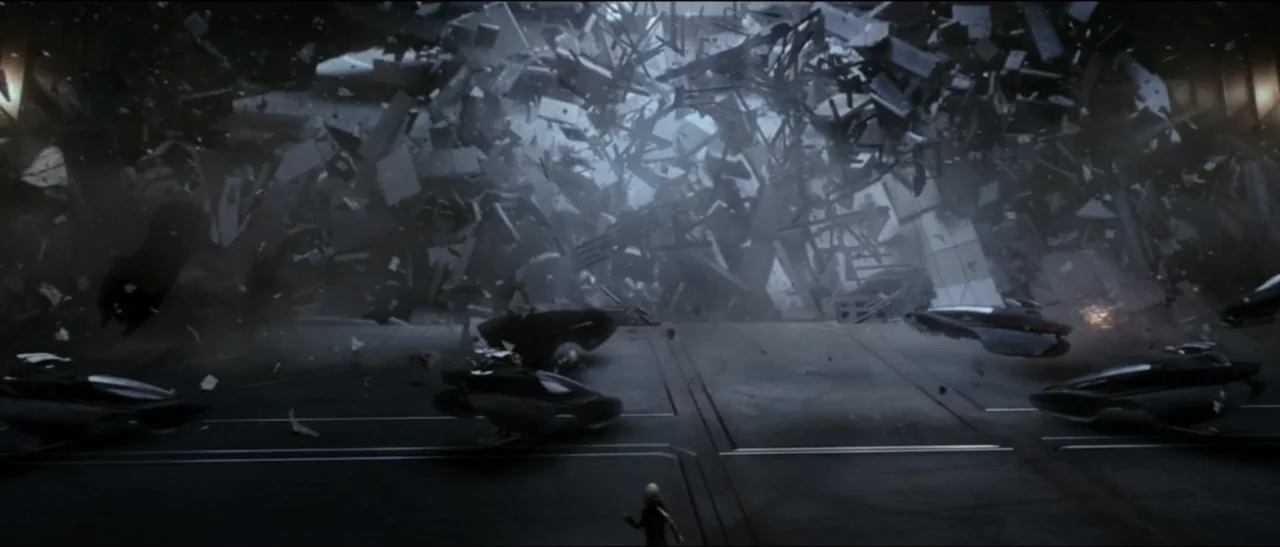 Star Trek: Nemesis (2002) movie still: wide — A dark, expansive landing platform faces a colossal, disintegrating structure of floating geometric…