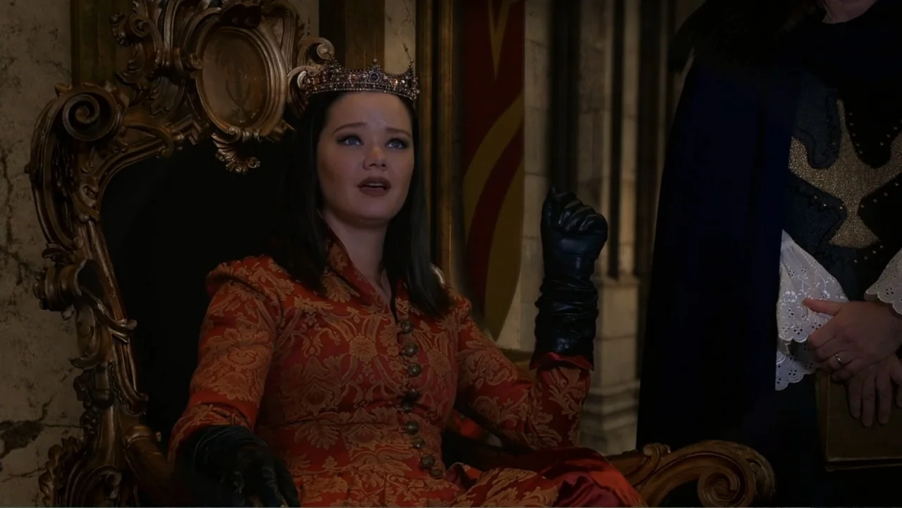 Empire Queen: The Golden Age of Magic (2024) movie still: medium — An opulent interior space with a carved wooden throne and stone architecture. A…