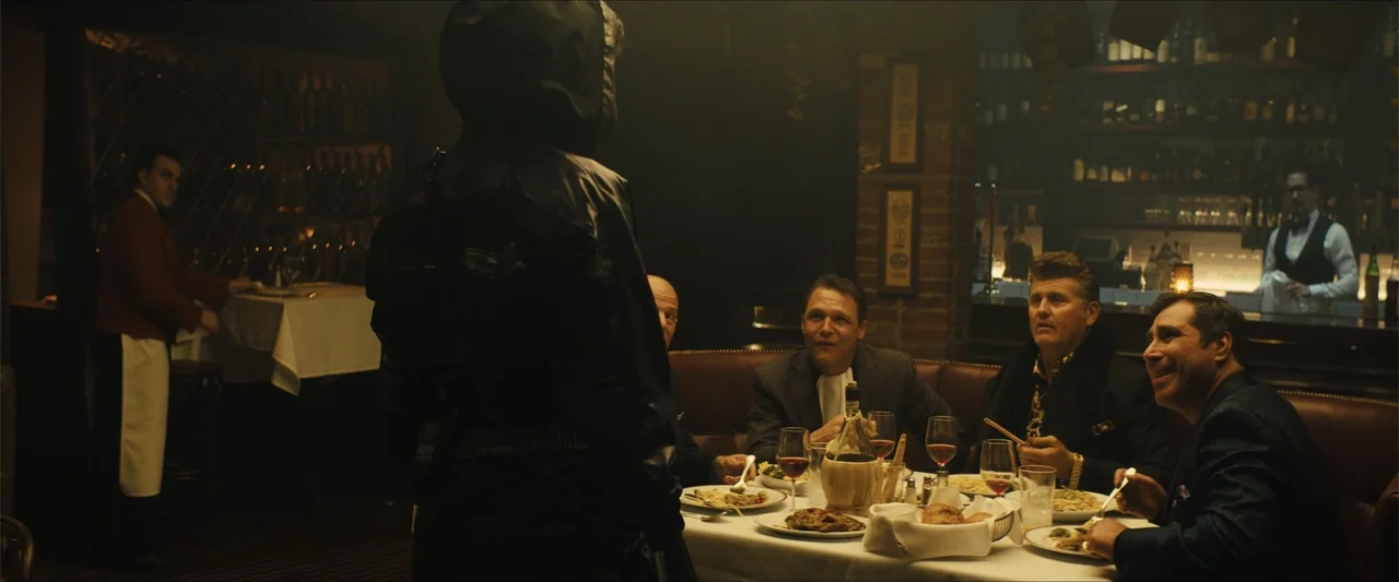 Birds of Prey (and the Fantabulous Emancipation of One Harley Quinn) (2020) movie still: medium — A dimly lit restaurant interior features a large…