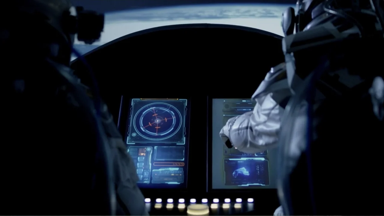 UFO Conspiracies: The Hidden Truth (2020) movie still: medium — A dark spacecraft cockpit faces a window showing the curvature of the Earth. Two…