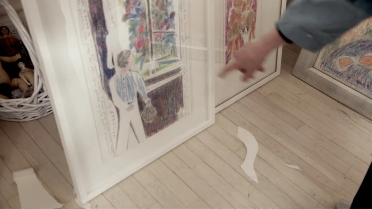 Nothing Left Unsaid: Gloria Vanderbilt & Anderson Cooper (2016) movie still: medium — A light wood floor supports several large white-framed…