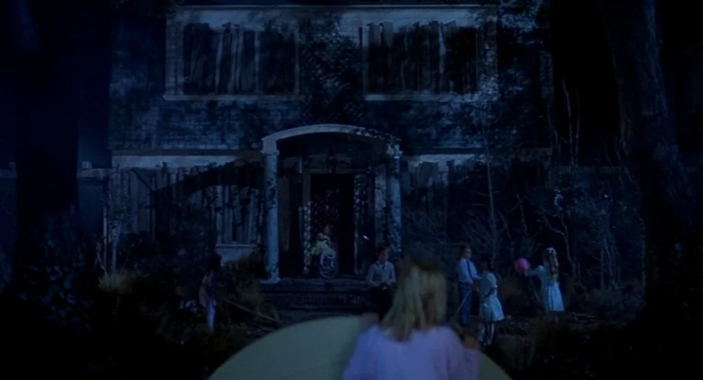 A Nightmare On Elm Street 3: Dream Warriors (1987) movie still: wide — A decrepit two-story residential house features windows covered with vertical…