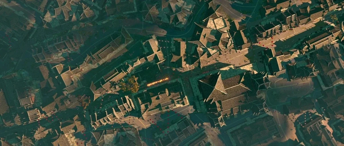 Kung Fu Panda 2 (2011) movie still: establishing — An aerial top-down view shows a dense settlement with traditional tiled roof structures. A…