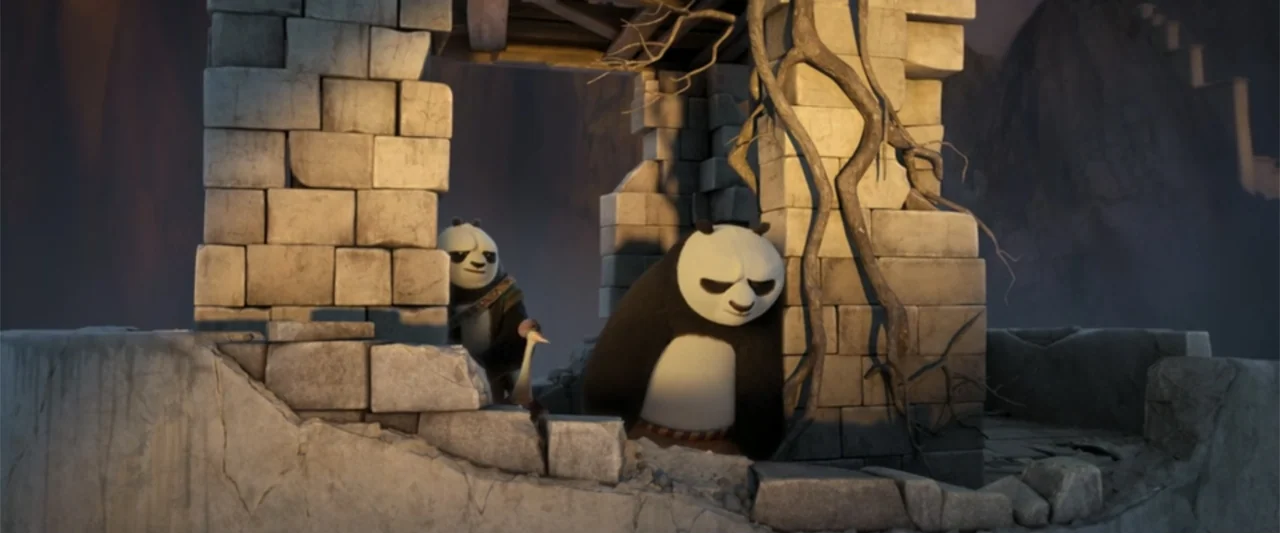 Kung Fu Panda 4 (2024) movie still: medium — An ancient stone structure with crumbling blocks and intertwined dried roots stands outdoors. Two…