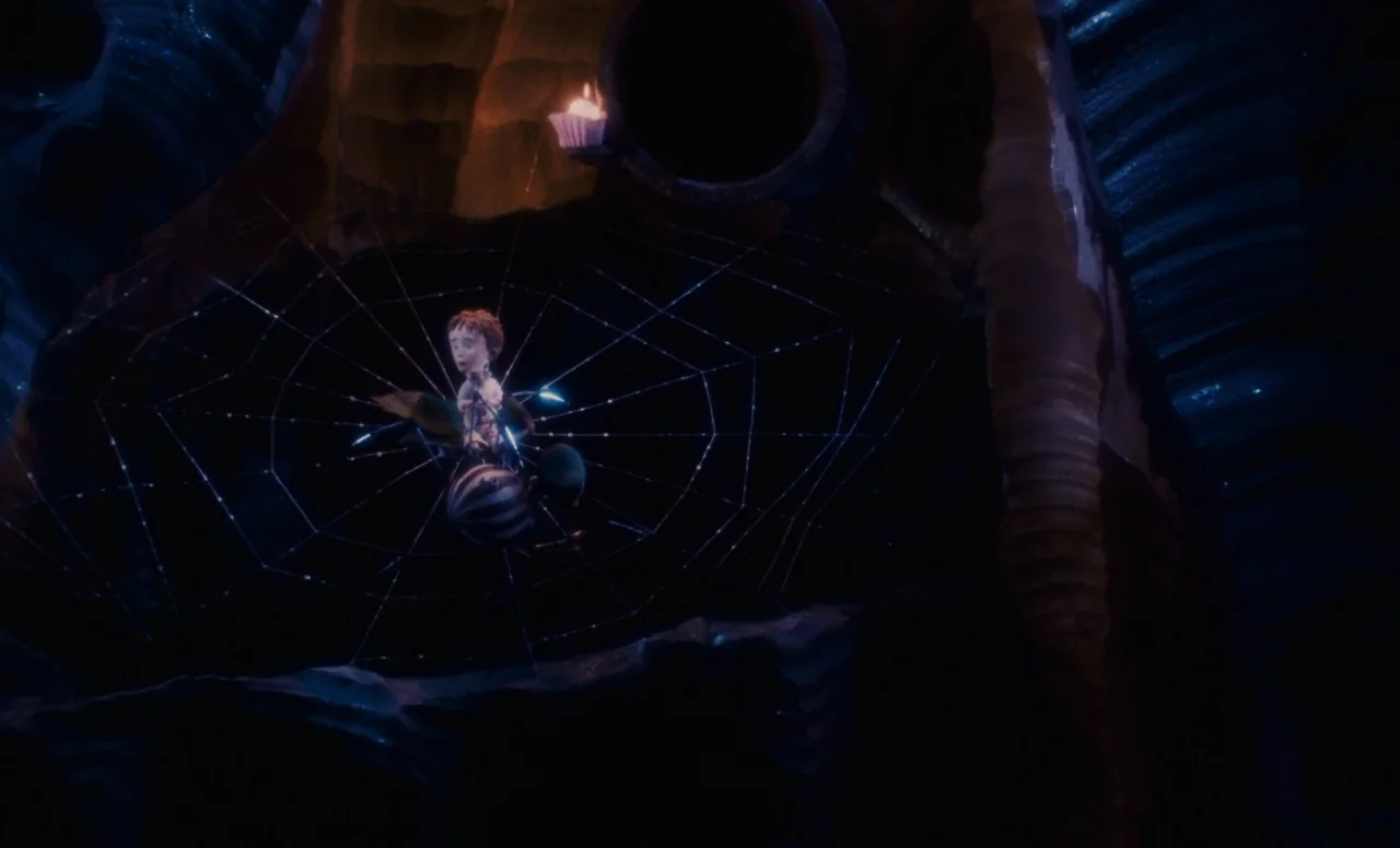 James and the Giant Peach (1996) movie still: wide — A dark, cavernous space is filled with shadows and large organic rock textures. A small boy…
