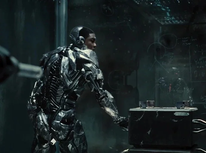 Zack Snyder's Justice League (2021) movie still: medium — A dark, industrial space features a wall covered in faint, chalk-written scientific…
