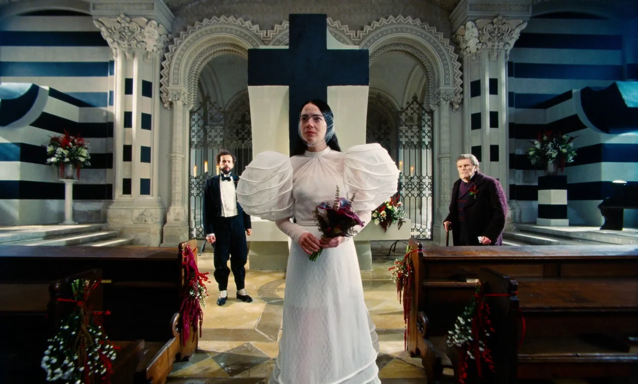 Poor Things (2023) movie still: fullbody — A stone cathedral interior features high vaulted arches and striped black-and-white columns. A woman in a…