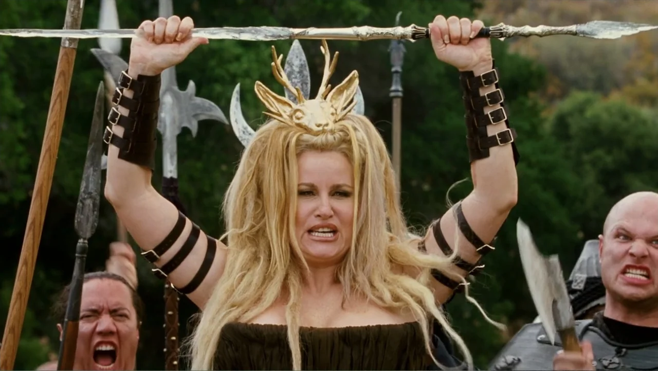 Epic Movie (2007) movie still: medium — A group of warriors in costume stand in a natural woodland clearing. A central woman holds a long spear…