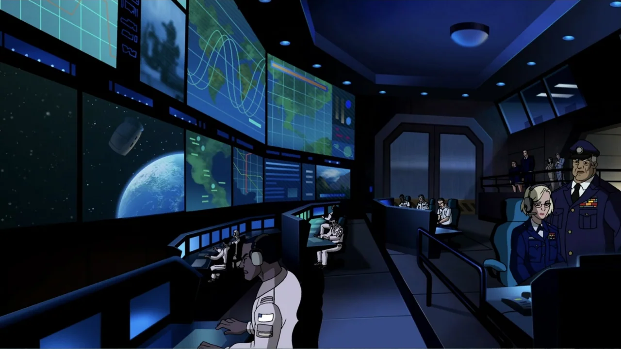 Superman/Batman: Public Enemies (2009) movie still: wide — A high-tech command center features large wall-mounted screens displaying space maps and…