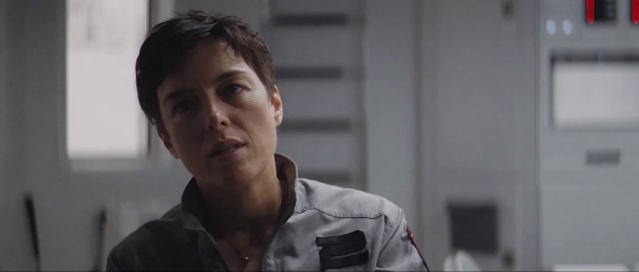 The Last Days On Mars (2013) movie still: closeup — A stark white interior with modular wall paneling and integrated technical control displays. A…