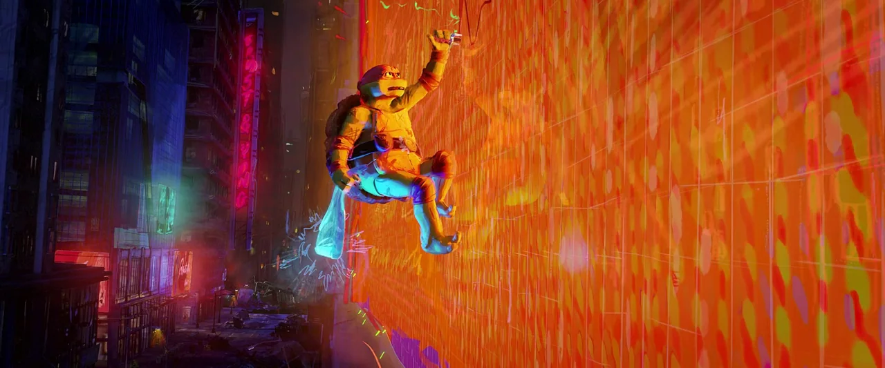 Teenage Mutant Ninja Turtles: Mutant Mayhem (2023) movie still: wide — A dense urban environment at night filled with towering buildings and glowing…