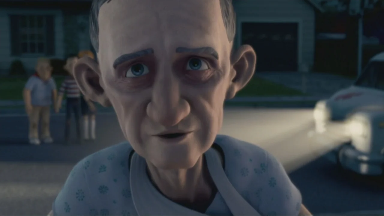 Monster House (2006) movie still: closeup — A quiet suburban street at night features a house and a car with illuminated headlights. An elderly man…