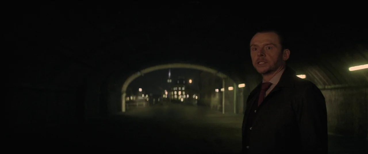Mission: Impossible – Fallout (2018) movie still: medium — A dark concrete underpass at night features a curved ceiling and distant street lights. A…