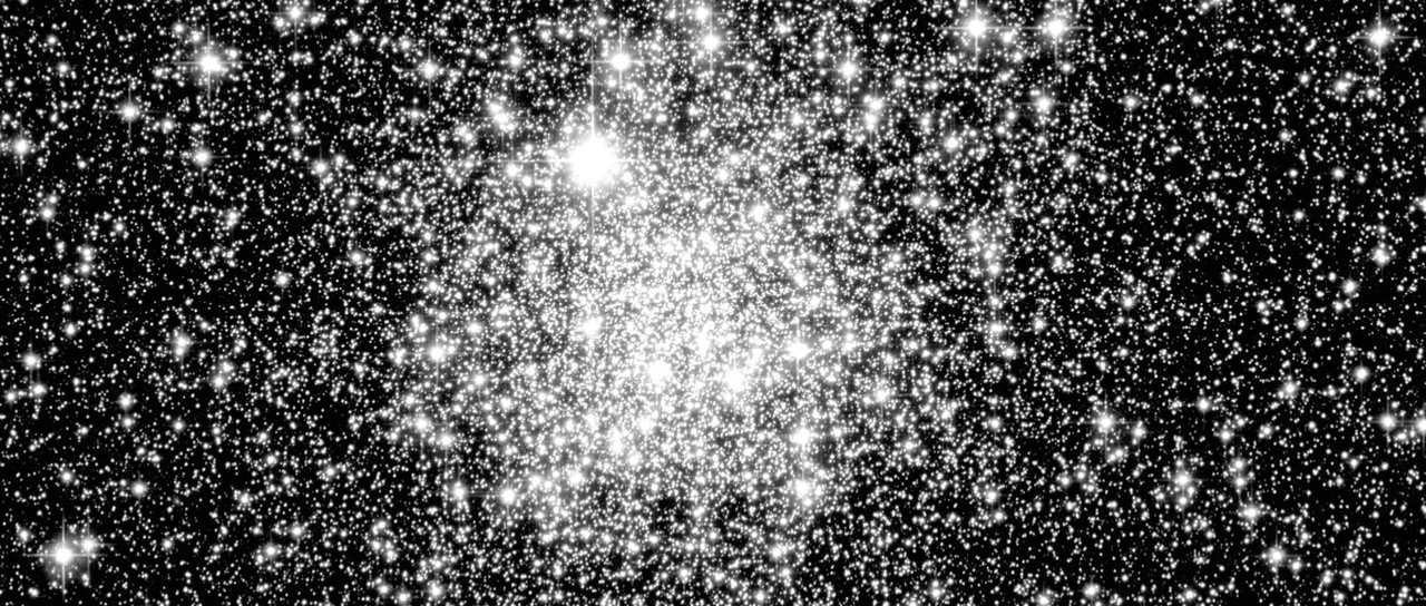 Embrace Of The Serpent (2015) movie still: establishing — A dense cluster of stars fills the void of deep space. White points of light are scattered…