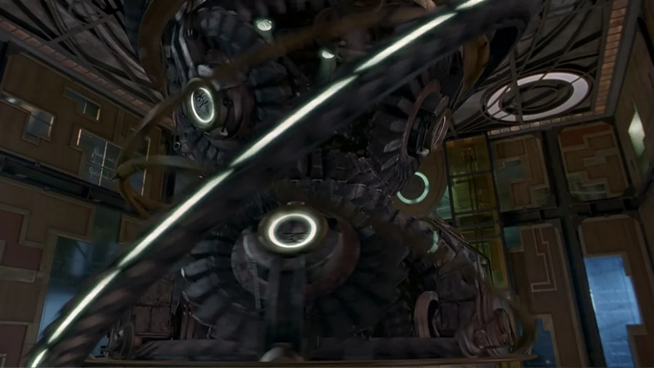 13 Ghosts (1960) movie still: medium — A complex dark mechanical structure with large interlocking gears sits inside a structured chamber. Several…