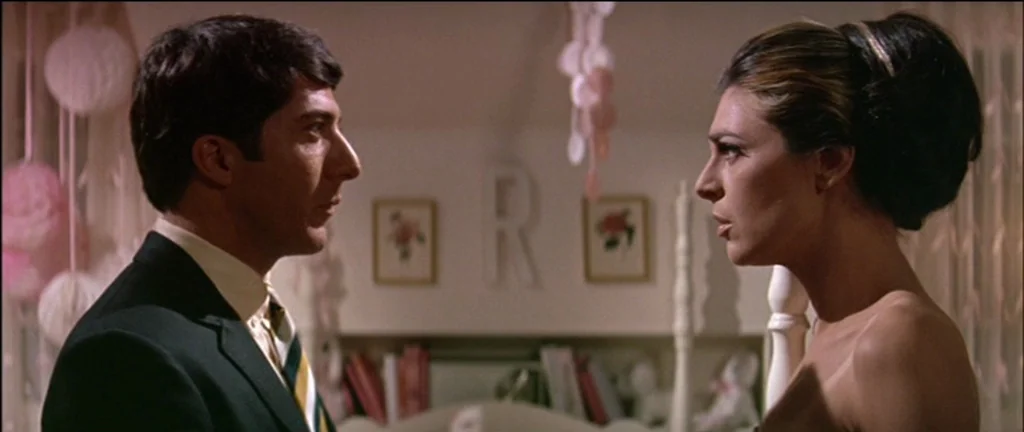 The Graduate (1967) movie still: medium — A bedroom decorated with hanging pink paper balls and a letter R wall decoration. A young man and a young…