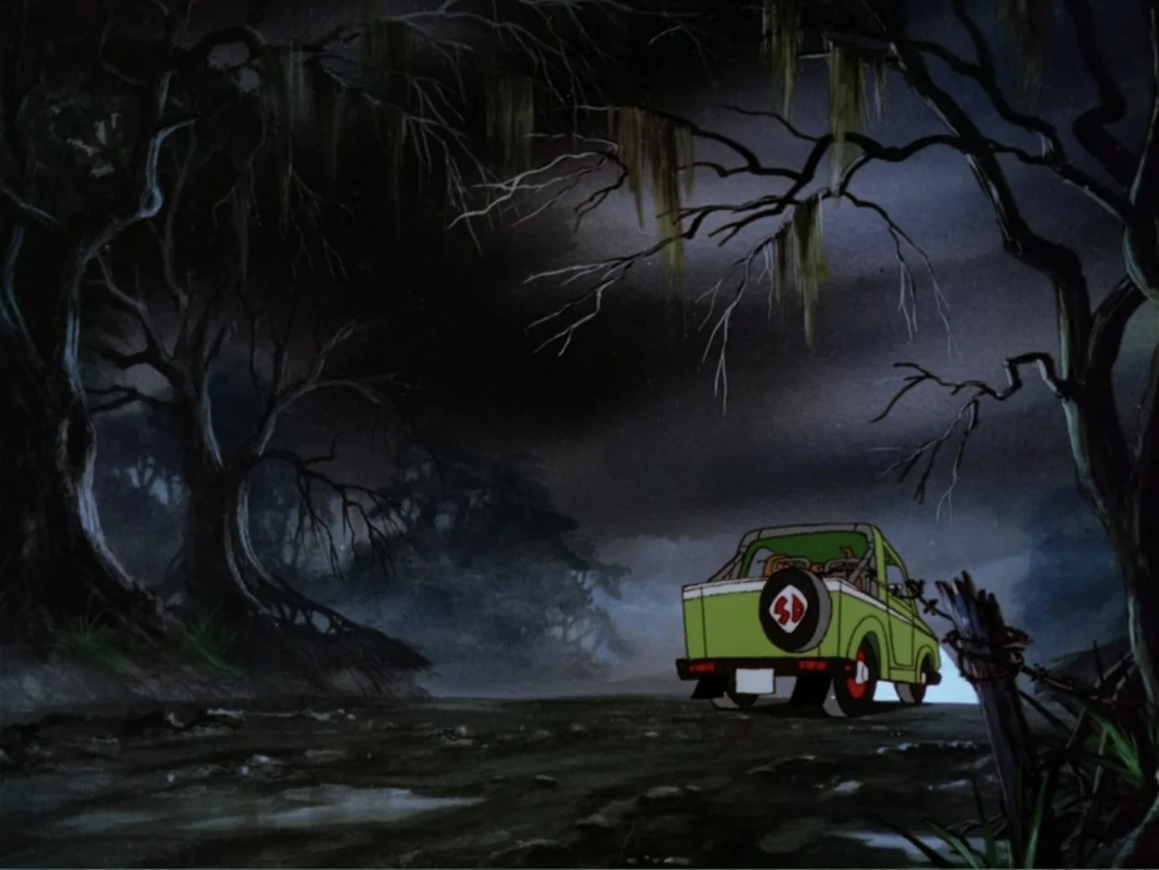 Scooby-Doo! Meets the Boo Brothers (1987) movie still: wide — A green utility vehicle sits parked on a muddy path at night. The surrounding…