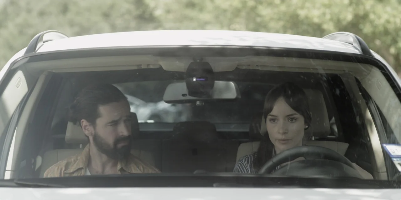 Stalked by My Doctor: A Sleepwalker's Nightmare (2019) movie still: medium — The interior of a moving white car seen from the front windshield view.…