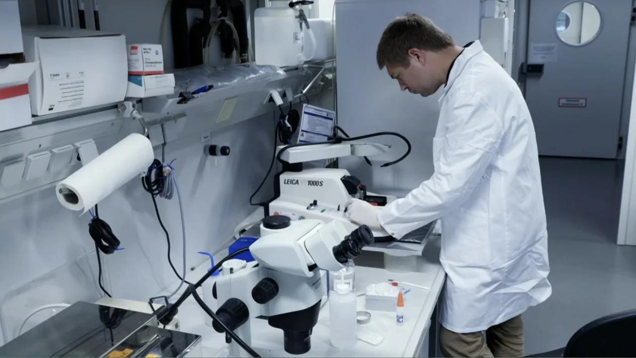 Almost Human: Rise of the Apes (2022) movie still: medium — A sterile laboratory workspace filled with specialized medical or research instruments…