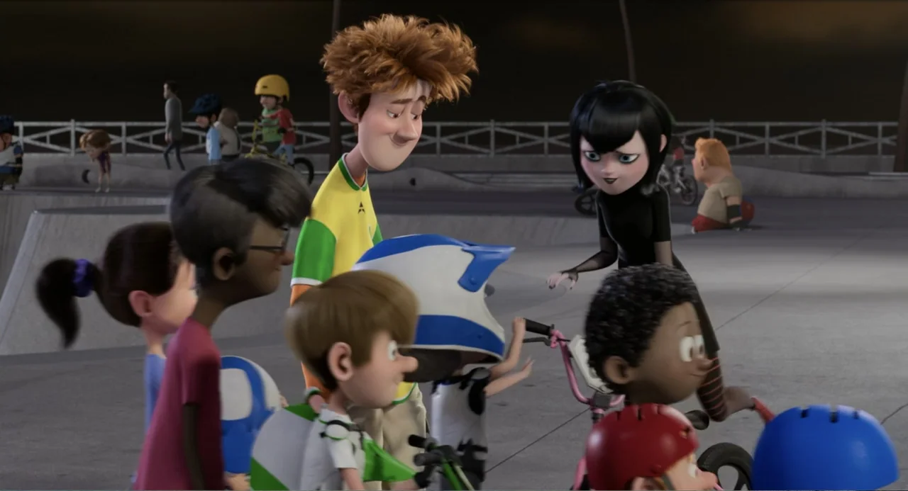 Hotel Transylvania 2 (2015) movie still: medium — A paved area with a metal railing in the back under a night sky. A group of children with bicycles…