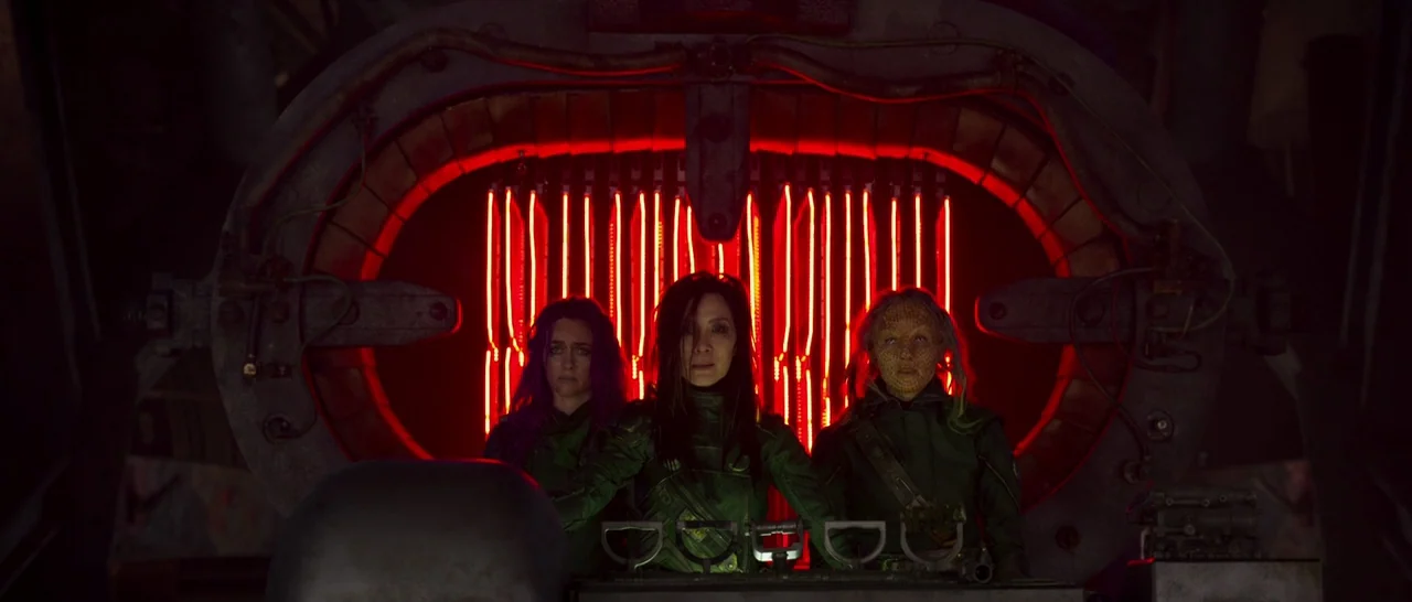 Guardians of the Galaxy Vol. 2 (2017) movie still: medium — A dark spaceship bridge features a large, metallic portal structure with vertical red…