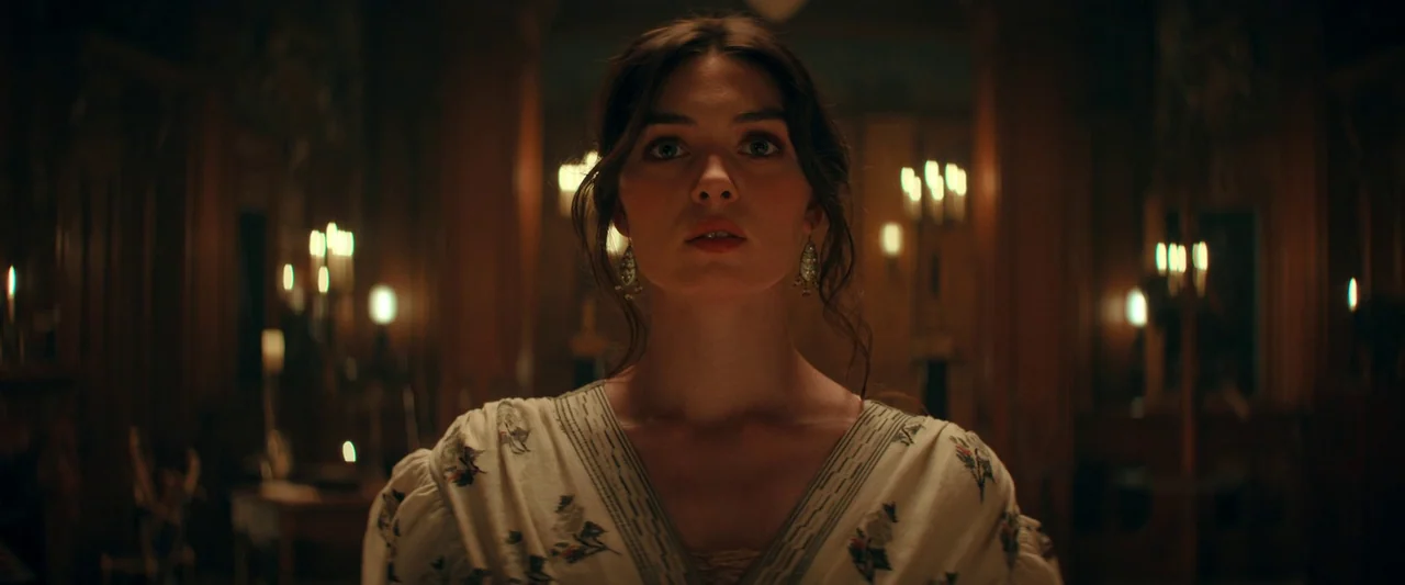 The Count of Monte-Cristo (2024) movie still: medium — A dark, wood-paneled room is filled with indistinct furniture and blurred glowing light…