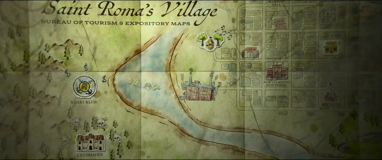 The Toxic Avenger (2023) movie still: closeup — An aged, folded paper map shows Saint Roma's Village with illustrated landmarks and symbols.…
