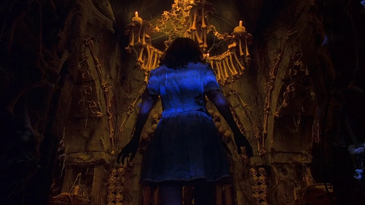 House of 1000 Corpses (2003) movie still: medium — A subterranean chamber features walls and a chandelier constructed entirely of human bones. A…