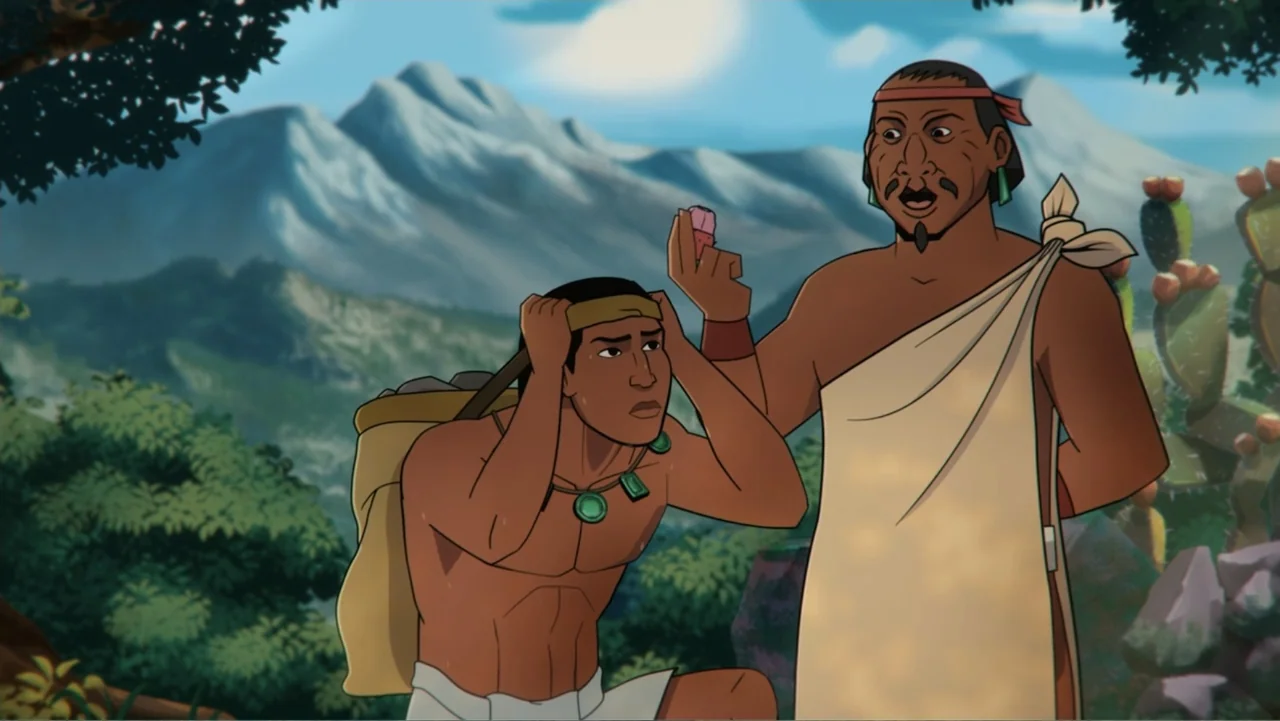 Aztec Batman: Clash of Empires (2025) movie still: medium — A mountain landscape features two men standing near cacti under a clear blue sky. One…