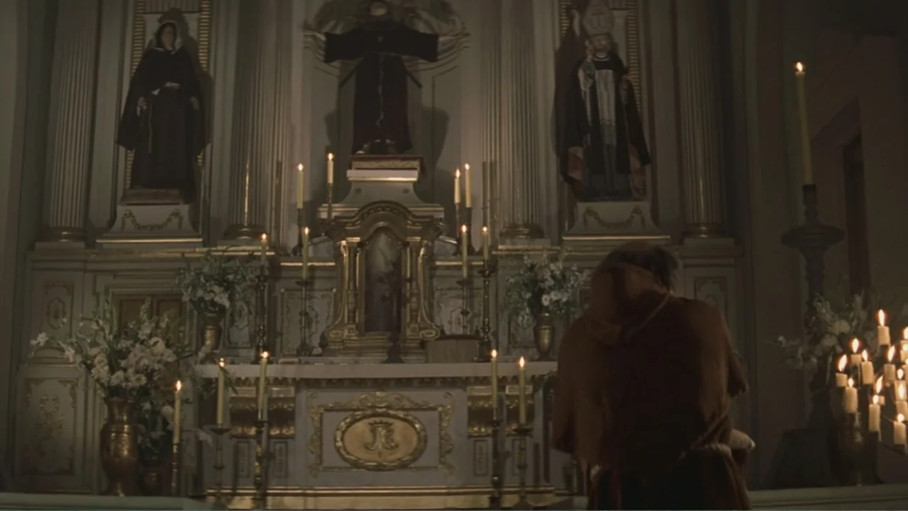 The Mask of Zorro (1998) movie still: medium — An ornate church altar features religious statues and floral arrangements arranged around a central…