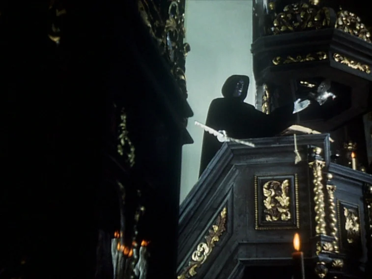 Valerie & Her Week of Wonders (1970) movie still: medium — An ornate dark wooden church pulpit features intricate gold carvings and candlelit…