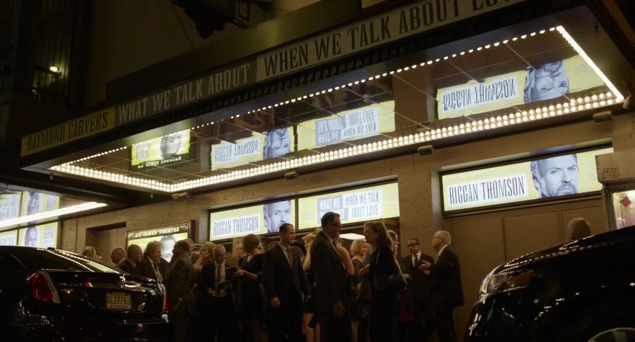 Birdman (2014) movie still: wide — The exterior of the St. James Theatre at night features a large illuminated marquee. A group of people in formal…
