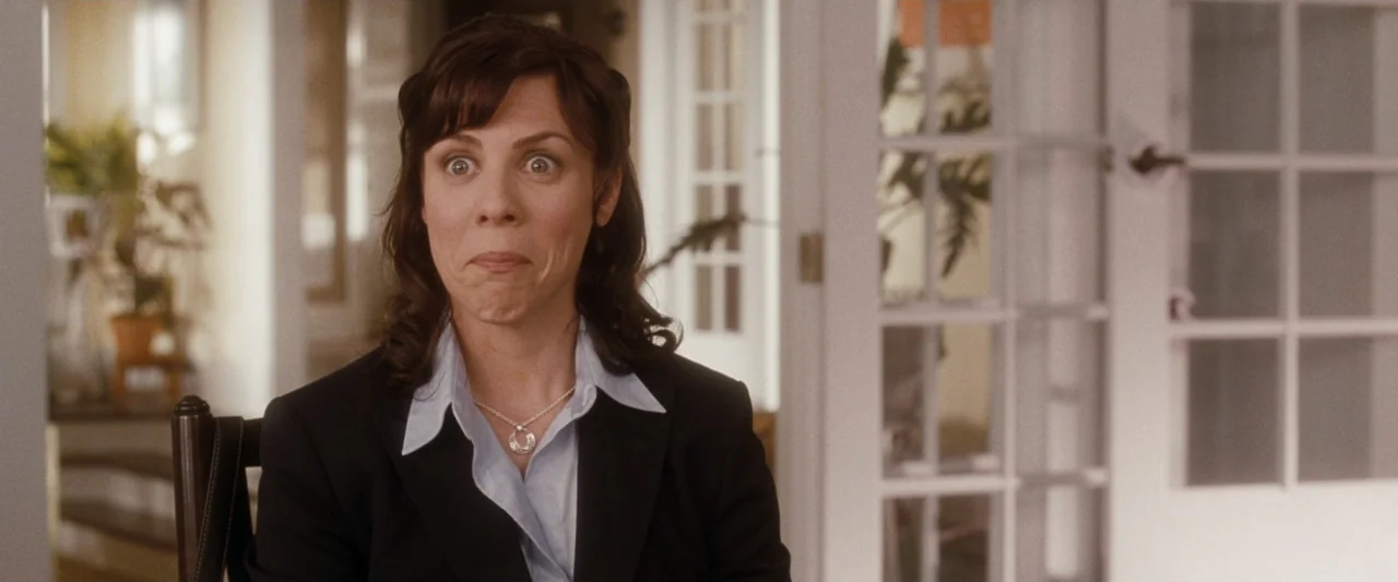Life As We Know It (2010) movie still: medium — A well-lit residential interior features a white door with glass panels in the background. A woman…