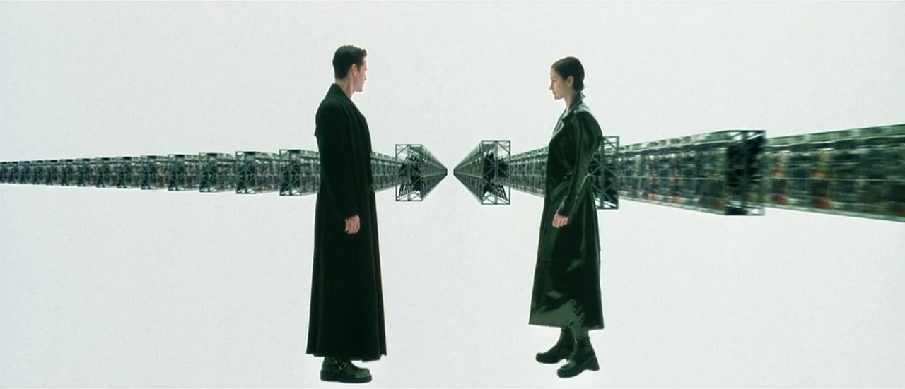 The Matrix (1999) movie still: wide — Two individuals stand in an infinite expanse of pure white space. Rows of floating metal grid frames extend…