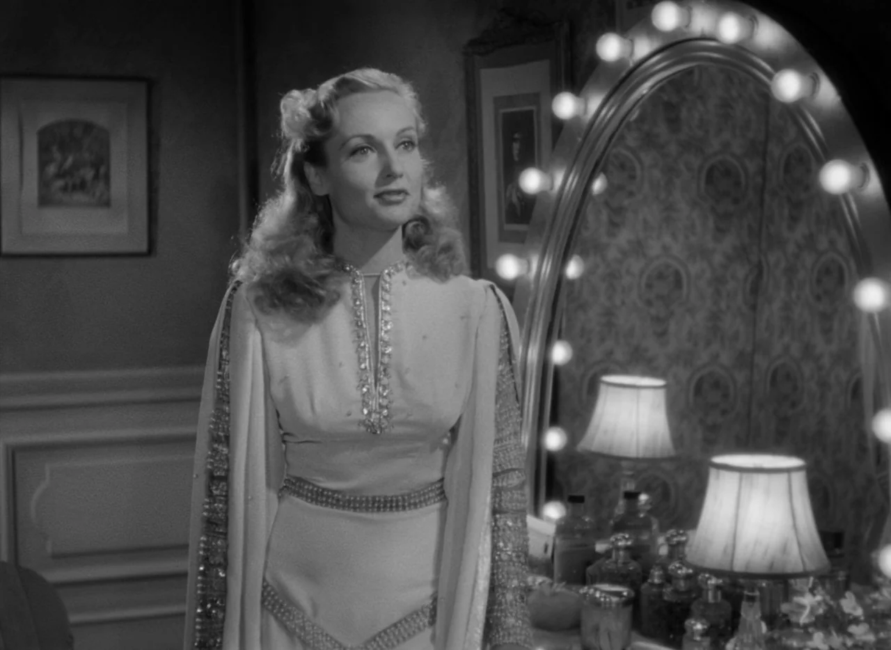 To Be or Not To Be (1942) movie still: medium — A well-lit vanity station contains a mirror surrounded by multiple incandescent light bulbs. The…