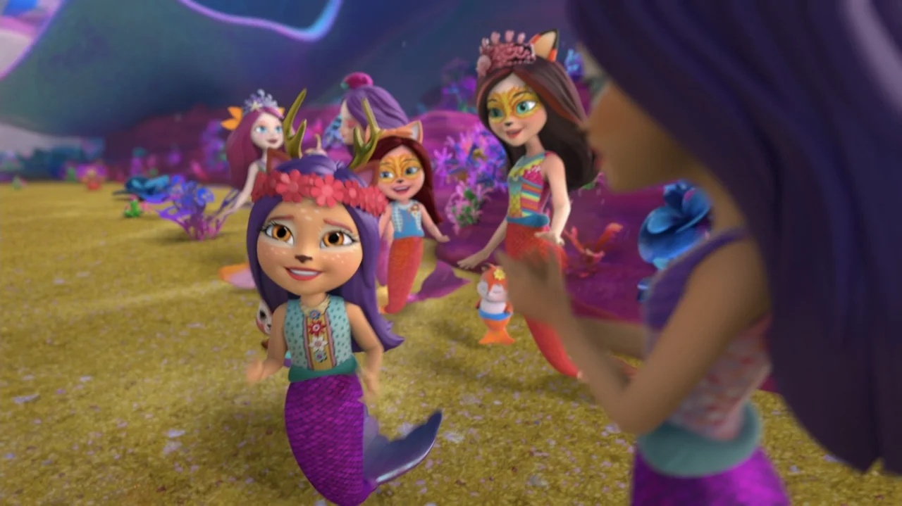 Enchantimals - Ocean Kingdom (2023) movie still: medium — A group of mermaid characters with animal-like features gather on a sandy seabed. The…