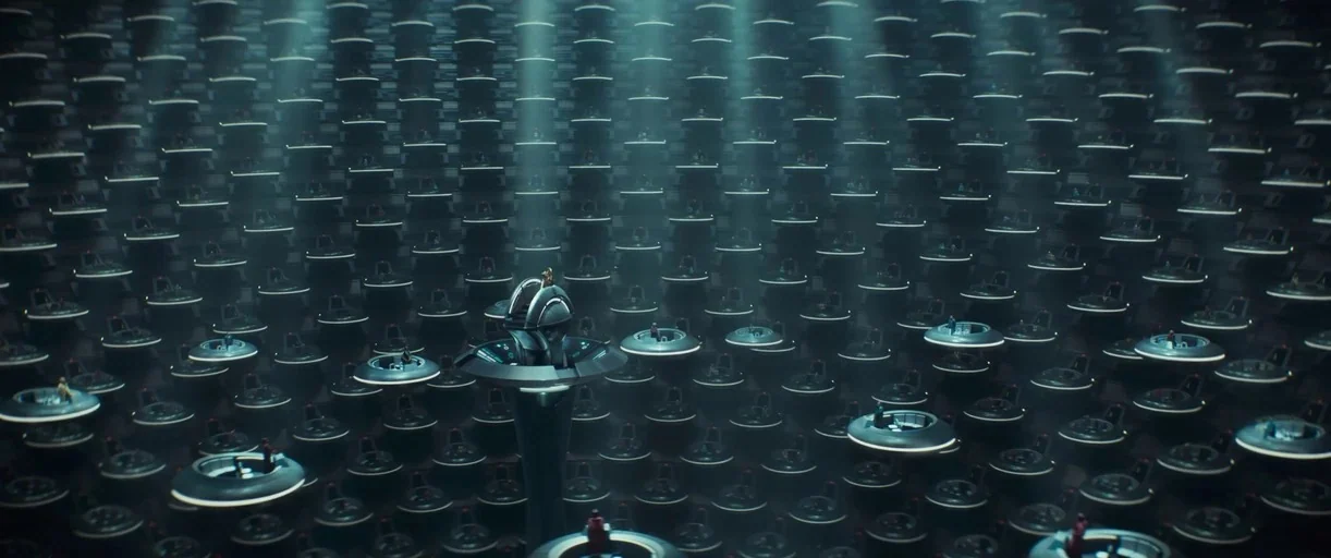 Andor (2022) movie still: establishing — An expansive circular legislative chamber contains hundreds of floating pods arranged in vast rows.…